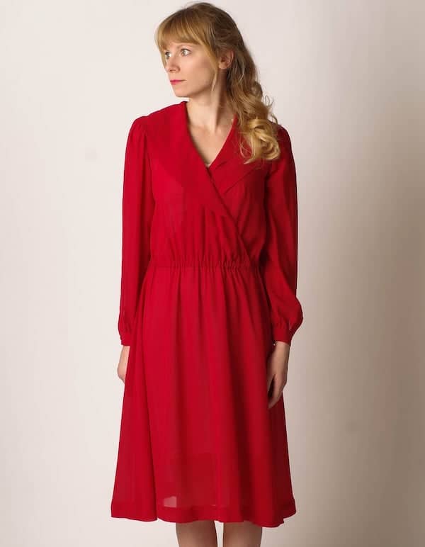 woman wearing a red blouson dress