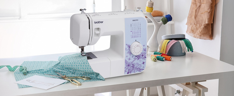 Brother XM2701 sewing machine on a table