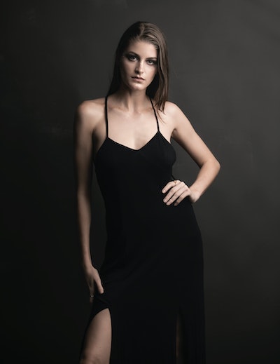 woman wearing a black camisole dress