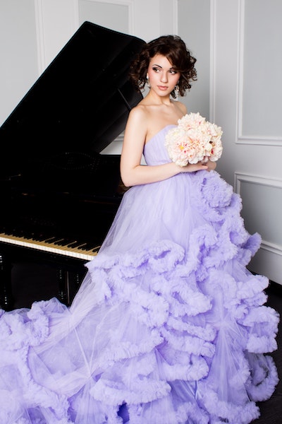 woman wearing lilac ballgown
